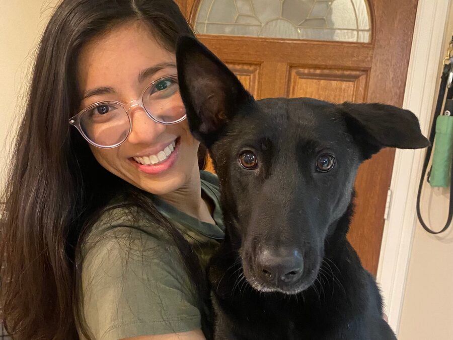 Mindy Dang, founder and lead trainer, with a client's dog